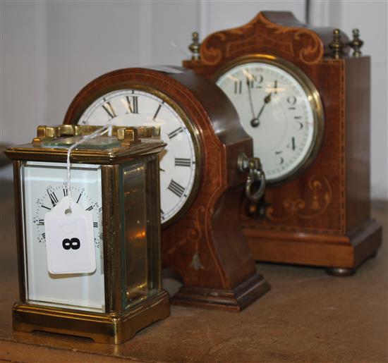 A 19th century brass carriage clock and a mahogany mantel clock with boxwood and mother of pearl inlay on brass feet  + 1 other